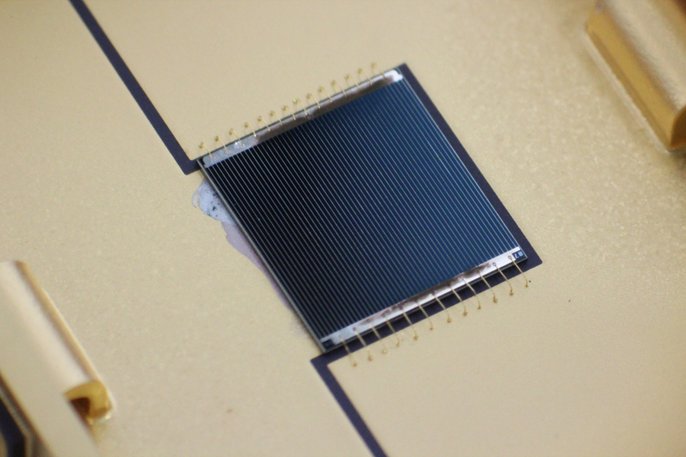 High efficiency multi-junction solar cell for concentrator application